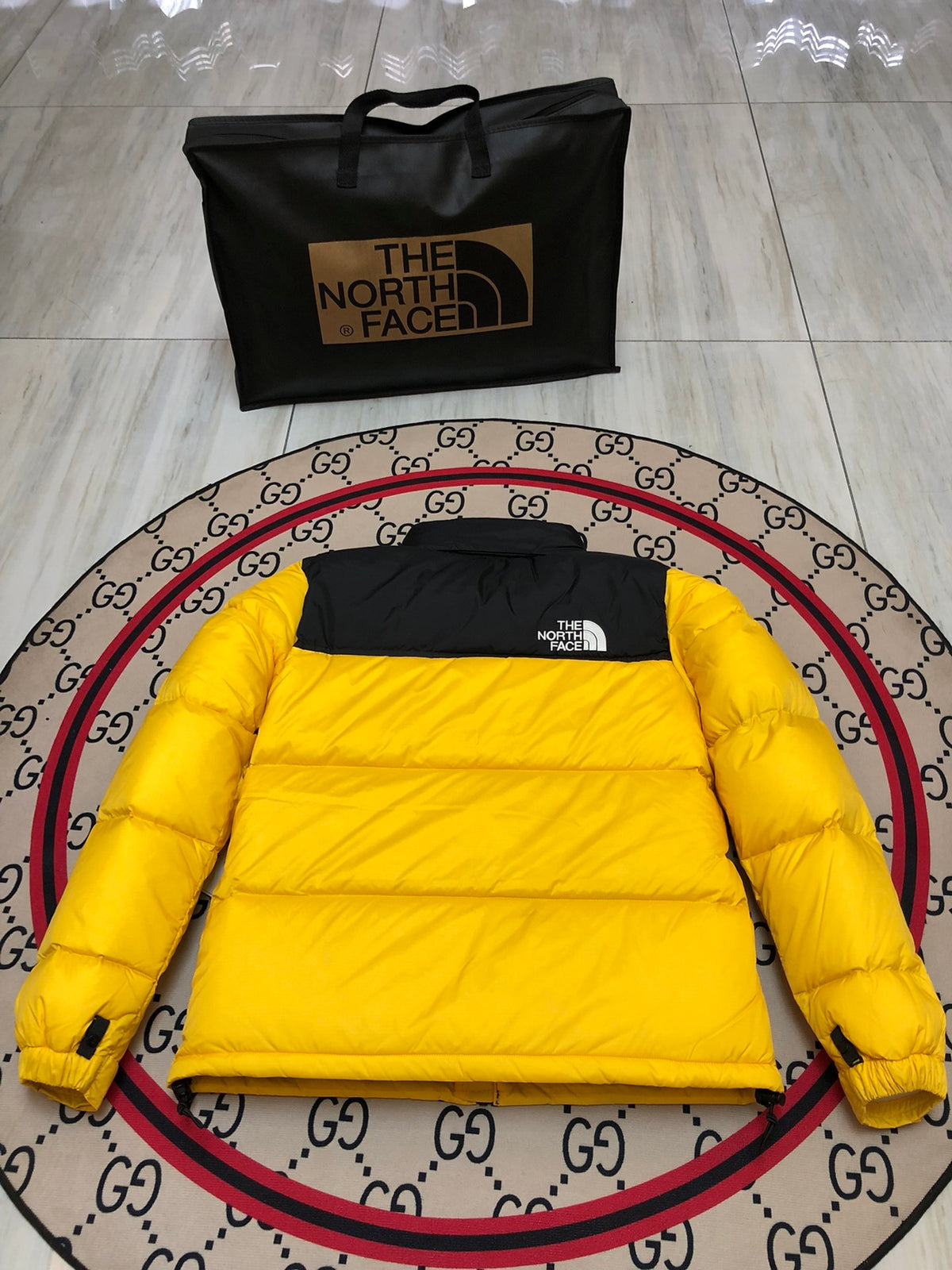 The North Face Yellow and Black Colorblock Puffer Jacket