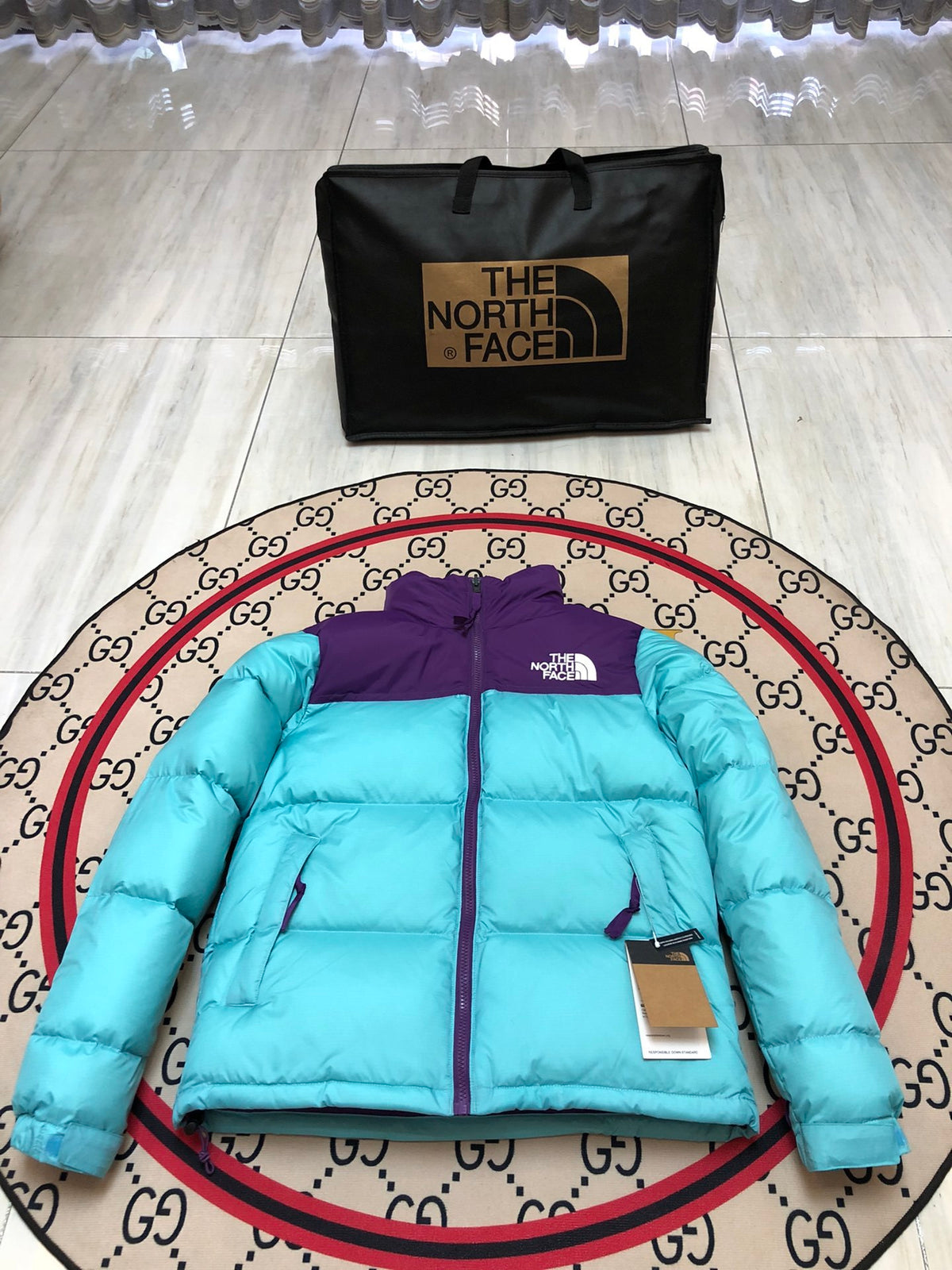 The North Face Turquoise and Purple Colorblock Puffer Jacket