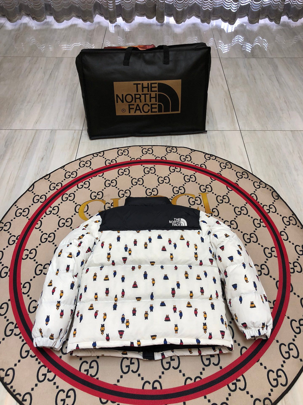 The North Face White and Black Bear-Print Puffer Jacket
